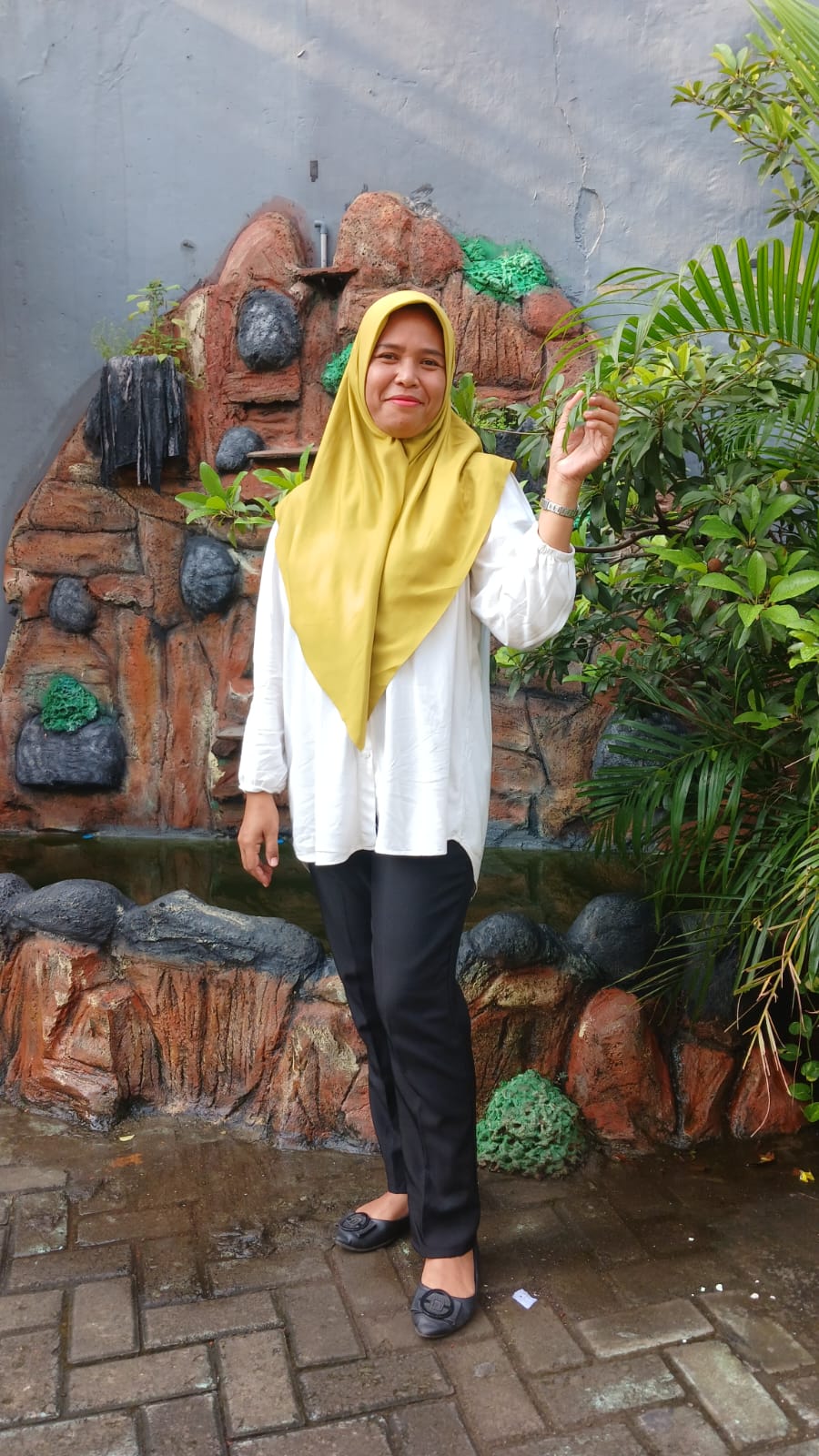 Eva Sri Wahyuni, S.Pd 